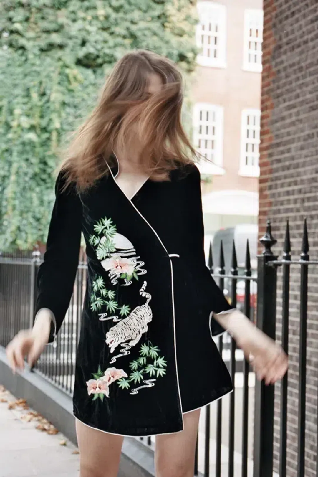 RIXO Iris Tiger Wrap Mini Dress Black Size UK 12 for rent on The Volte - main image